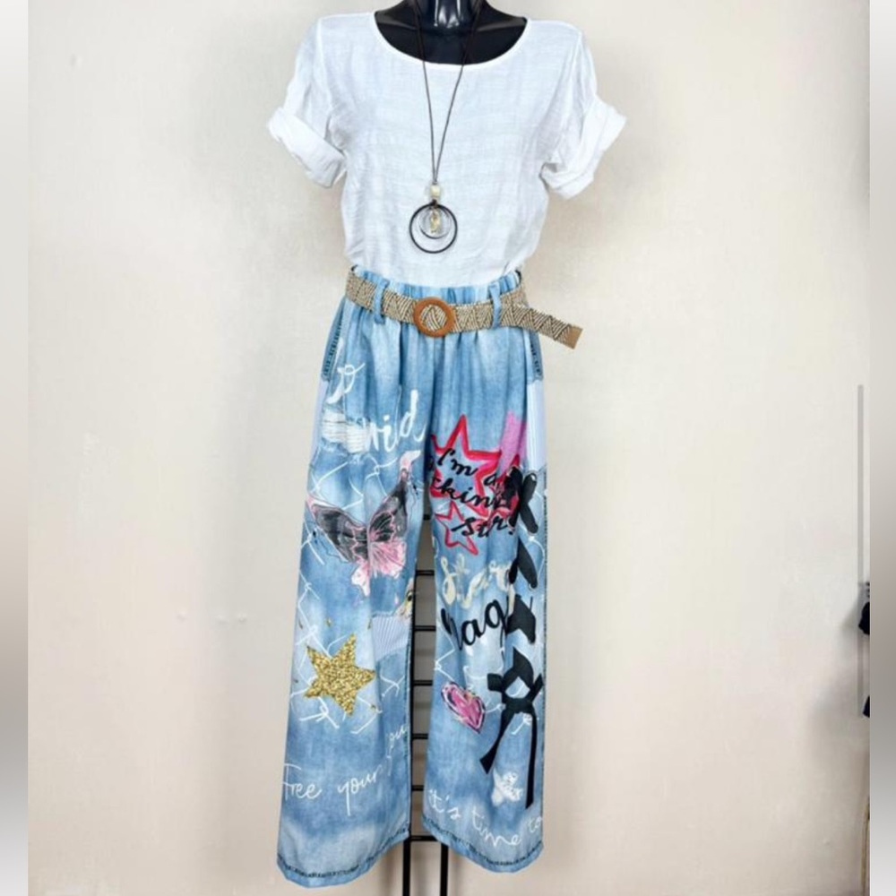 ShopEvelynne Light Blue Wide Leg Pants with Multicolor Graphic Accents